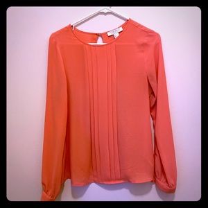 Coral silk blouse w subtle tuxedo detailing